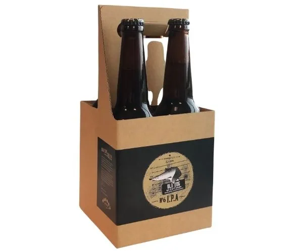 A four-pack of amber bottles in a kraft carrier, the label carrying a petrel and the name No.6 I.P.A.