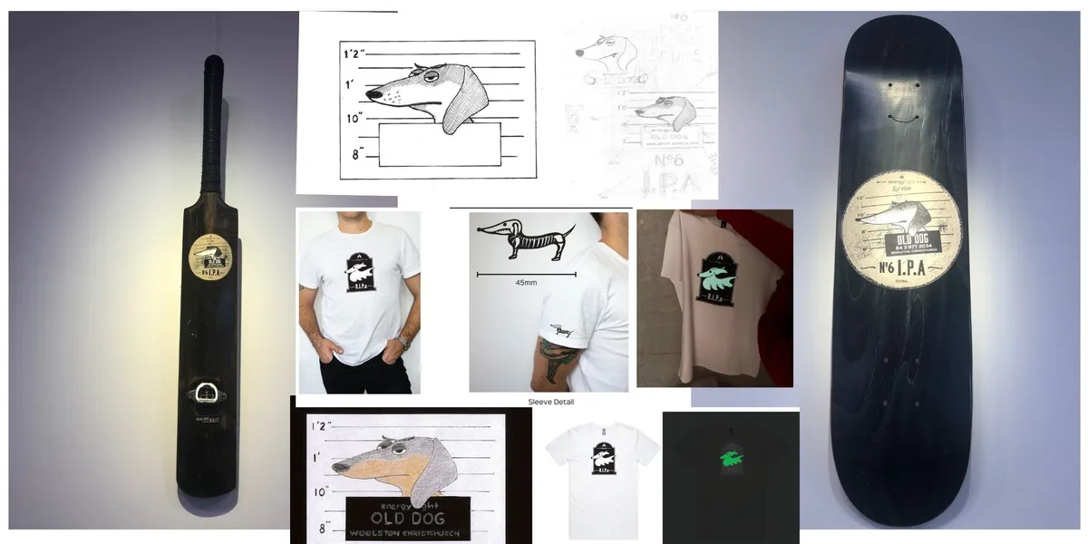 A board of the merchandise and the design work behind it: a cricket bat and a skateboard deck both carrying beer labels, pencil studies of a long dog, and printed tees pinned up between them.